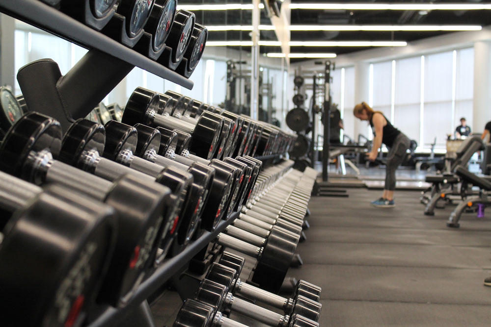 barbells in workplace fitness facility