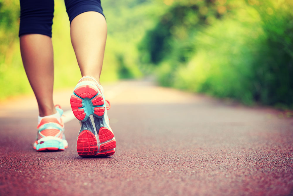 woman's shoes walking in nature