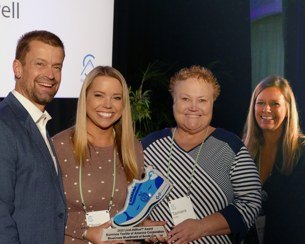 suminoe textile winners with blue shoe