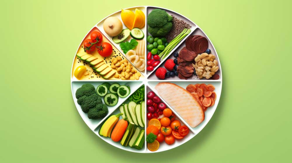 plate with fruits and vegetables with green background