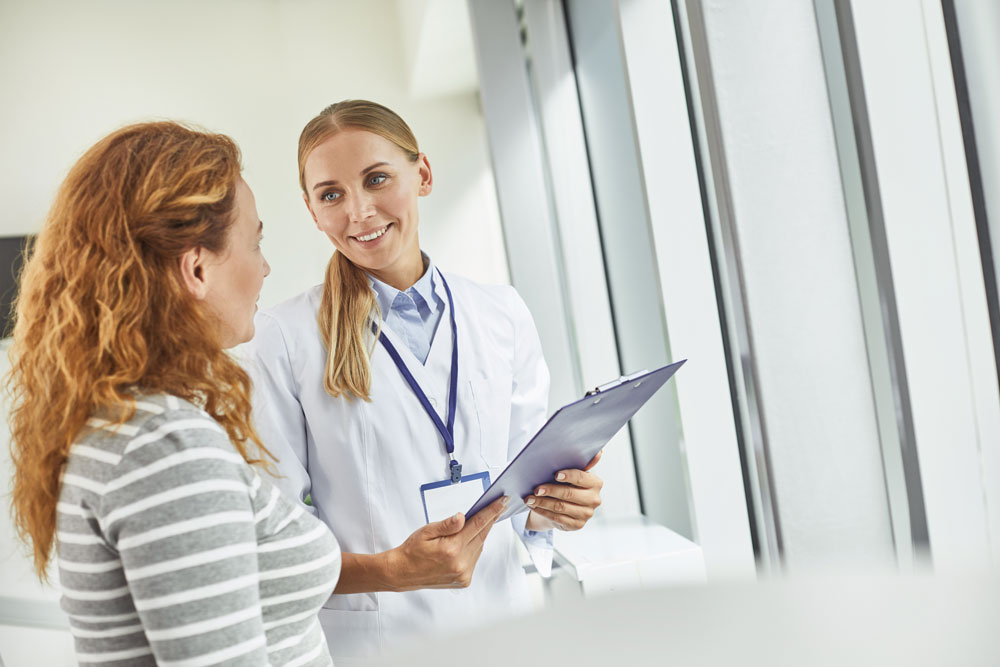 Patient speaks with doctor